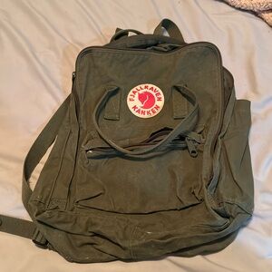 Barely used like new fjallraven kanken backpack kanken 23510 in olive green.